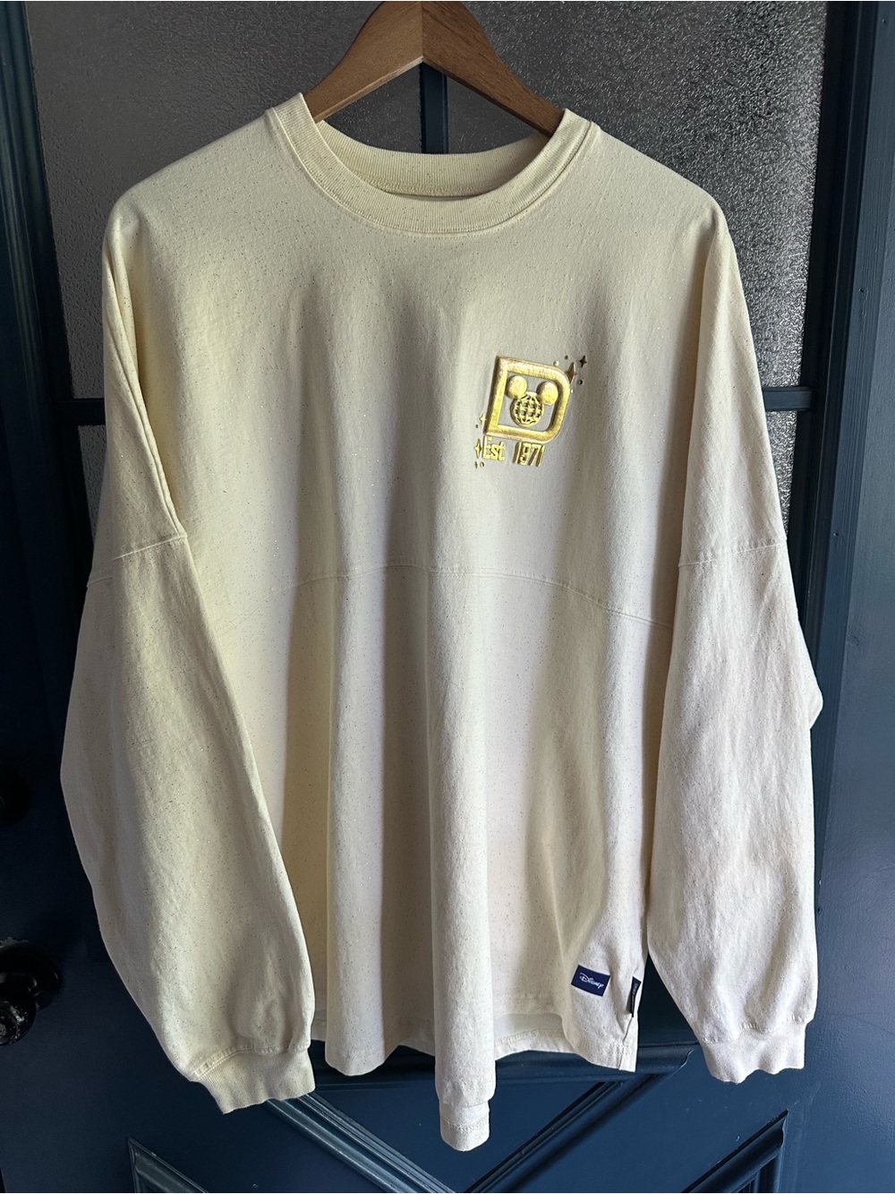 Disney Parks Cream and Gold Pixie Dust Castle Spirit Jersey